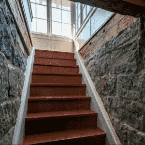 Page Farms: Access steps to original cellar repurposed into game room